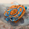 Pendant from a fashion statement necklace made of blue and coral clay.