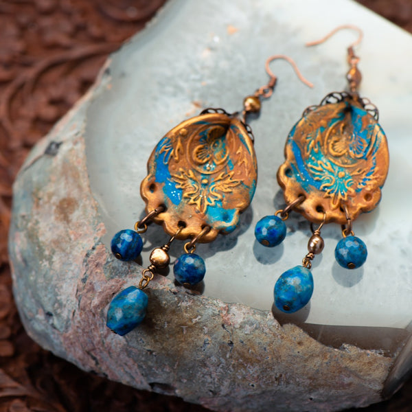 handmade earrings made of clay, lapis, and fresh water pearls.
