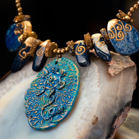fashion statement necklace made of clay, lapis, druzy,  and pewter balls.