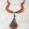 Fashion statement necklace made of clay, chrysocolla and lapis